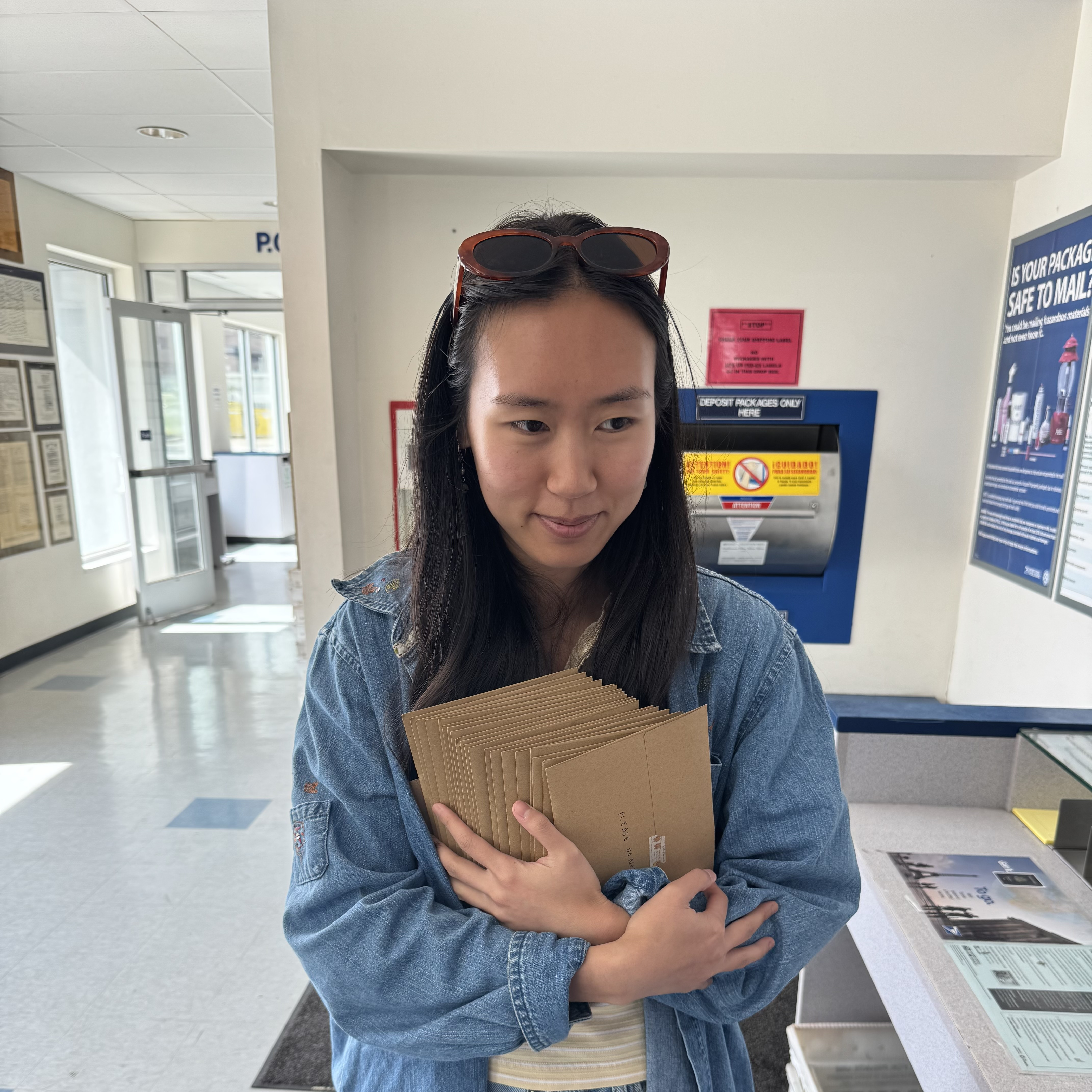 Creator of Little Letter Club drawing at the park