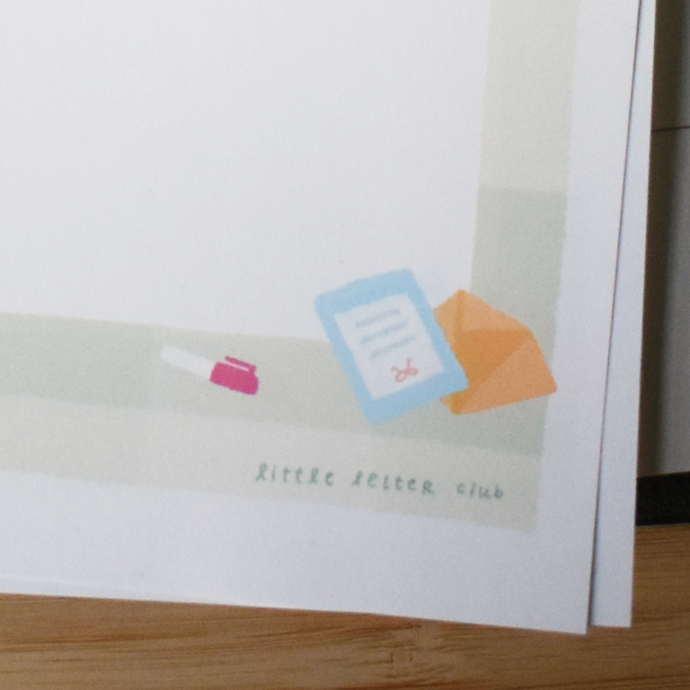 Closeup of stationery featuring an envelope and letter sheet